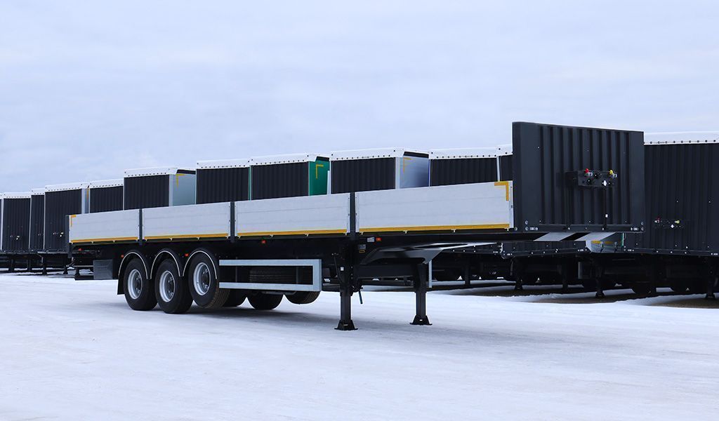 Бортовой полуприцеп с кониками Тонар B3-13/K | GoodTruck